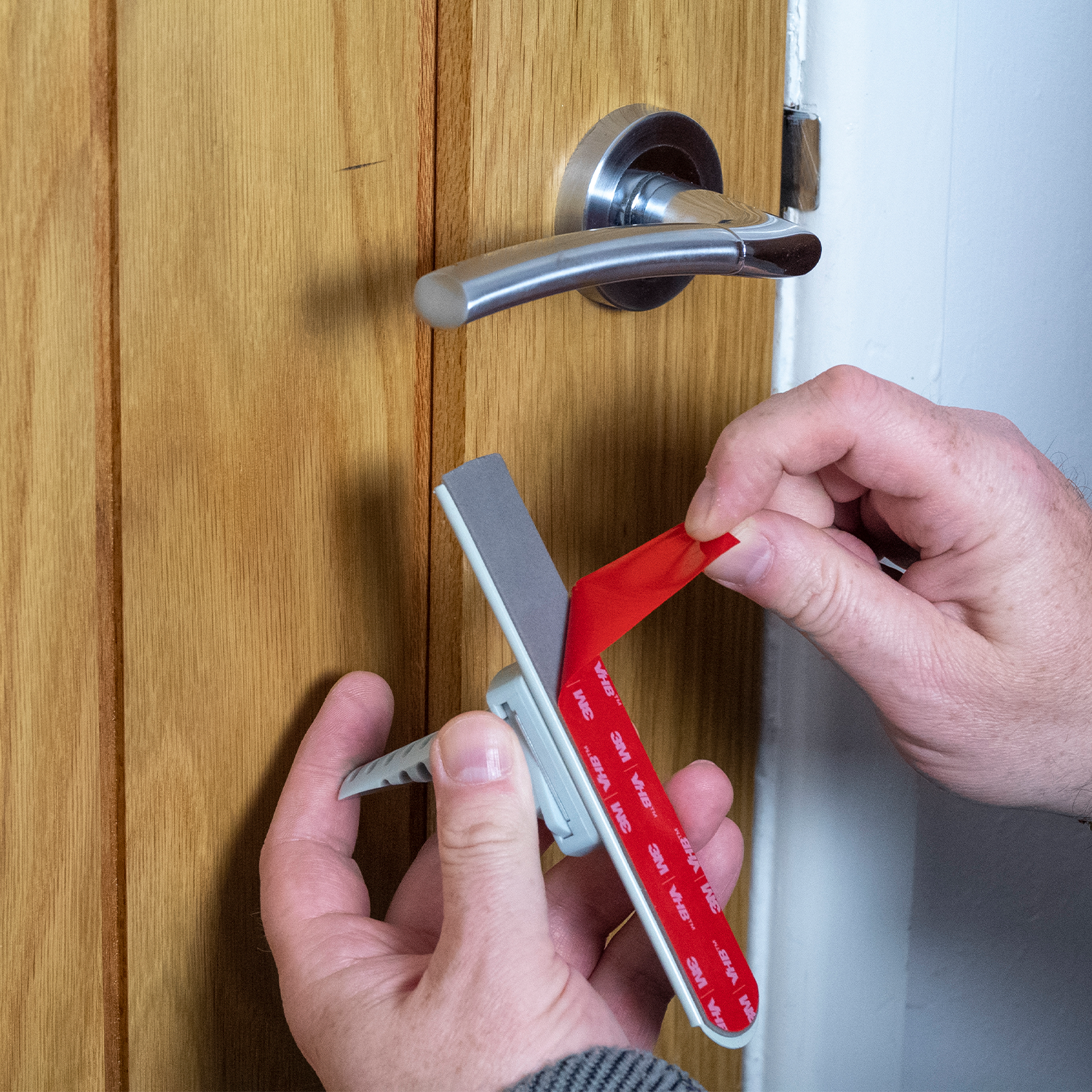 Preventing any door lever handle from being pushed downward, effectively securing the door and preventing unauthorised access