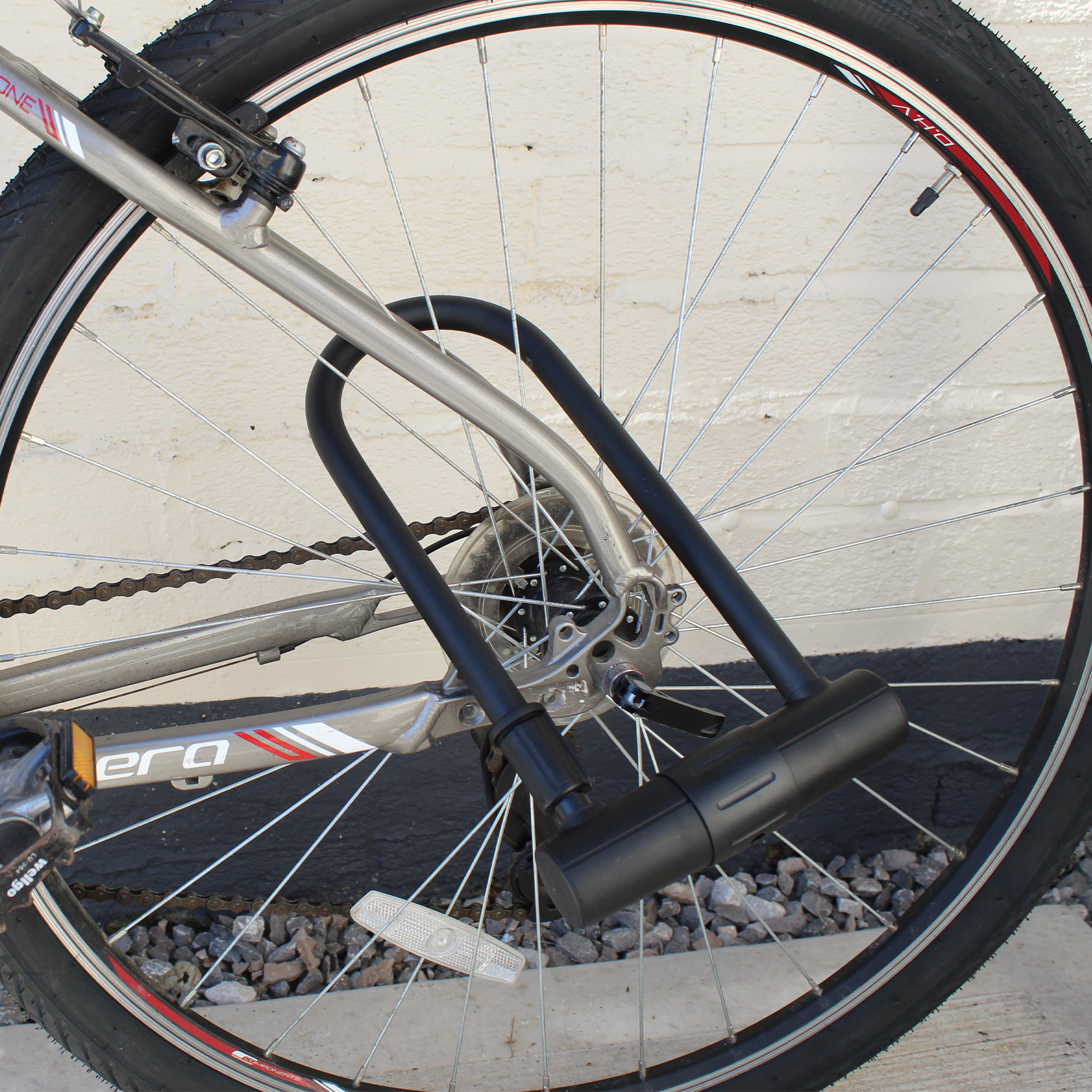 Heavy-duty bike lock with hardened steel shackle and protective coating
