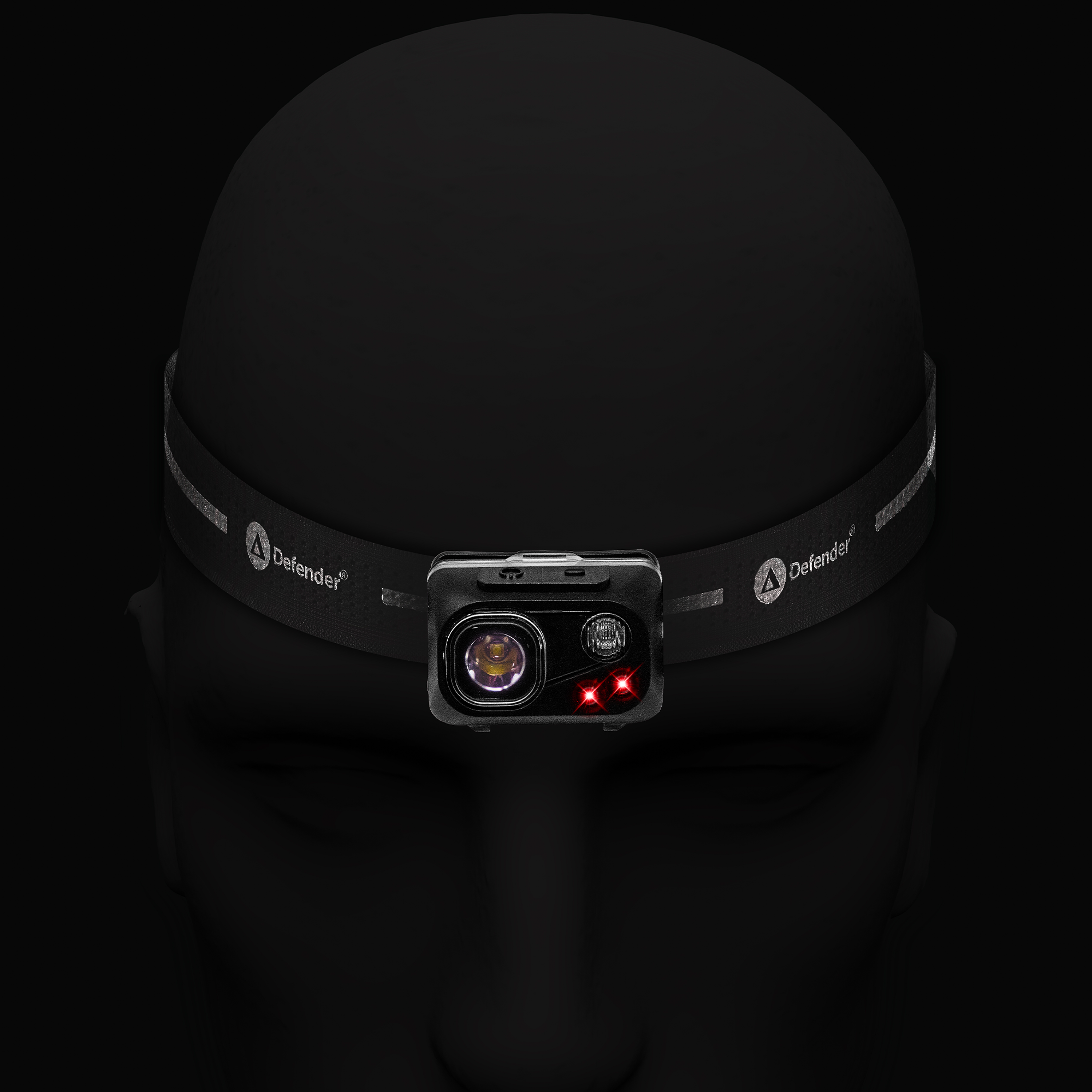 Lightweight Defender Lumos head torch with spotlight and floodlight